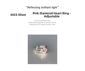 Macro shot of S925 silver ring featuring hammered texture and pink heart-shaped stone