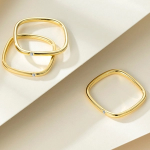Minimalist square 925 sterling silver ring in gold with a single center cubic zirconia