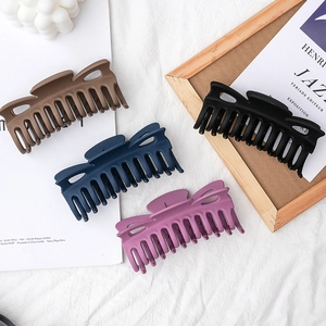 Matte large shark hair claws in brown blue purple and black for elegant hairstyling
