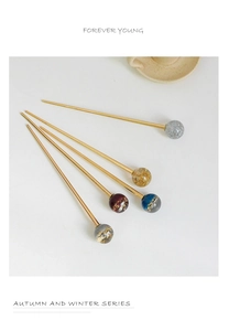 Détails de cinq pics à cheveux minimalistes avec feuille d'or et perles étoilées