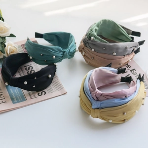 Elegant wide knot headband with faux pearl beads in multiple colors for women