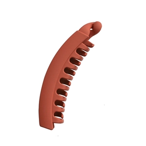Terracotta matte banana hair clip with interlocking teeth for daily ponytail styling