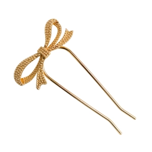 Minimalist gold bow-shaped U-shaped hair pin with textured matte finish for elegant styling