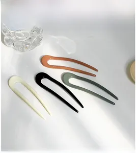 French style U-shaped hair pins in cream, black, amber, and green resin finishes