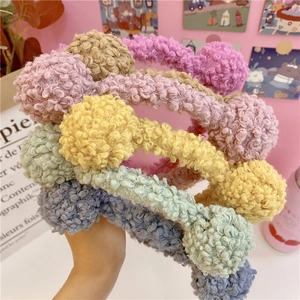 Cute macaron wavy plush headband for women with soft textured faux fur material