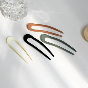 Modern U-shaped resin hair sticks set in four colors for elegant hair styling