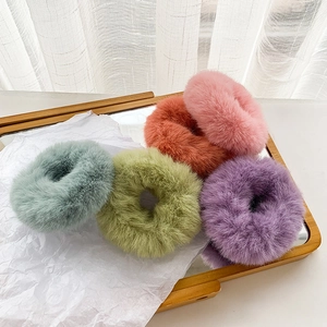 Five-pack of plush faux fur scrunchies with cute rabbit ears in various soft colors