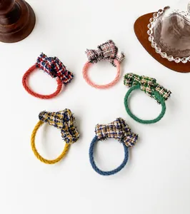 Detailed set of 5 tweed bow hair ties in red, pink, green, yellow and blue colors