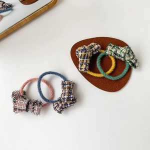 Elegant tweed bow hair tie set in pastel pink, blue, yellow, and green colors
