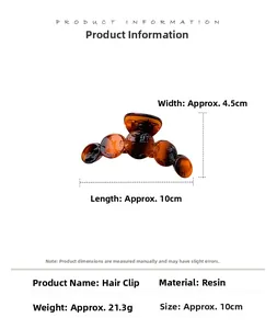 Detailed size specifications for amber resin hair claw clip showing 10cm length and 4.5cm width