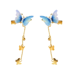 Traditional blue butterfly hair clips with golden tassels and pearls for children