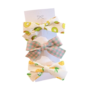 Ensemble de trois barrettes à nœuds pour enfants avec motifs fruits et carreaux