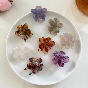 Set of 8 mini resin flower hair claws with marble and tortoiseshell patterns