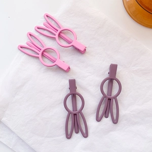 Cute bunny ear hair clips set in pink and purple matte finish for women and girls