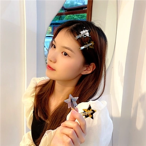 Star-shaped acetate hair clips with tortoiseshell and marble patterns for women