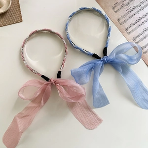 Serre-tête tressé floral avec perles et nœuds en organza en rose et bleu pastel