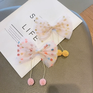 Creative mesh bow hair clip for girls featuring gold foil dots and colorful pom-poms