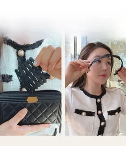 Foldable matte black headband showing compact storage and anti-slip toothed design