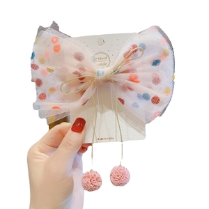 White polka dot mesh bow hair clip with gold thread and pink pompom charms for girls