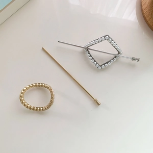 Minimalist geometric hair sticks set with pearl inlay and metallic hammered texture