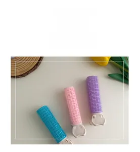 Detail showing colorful hair root clips with velcro surface for natural volume and styling