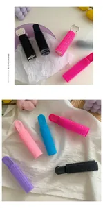 Detail view of multi-color hair root clips with velcro texture for volume and styling