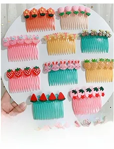 Close-up of colorful fruit and animal pattern hair combs in pastel resin materials