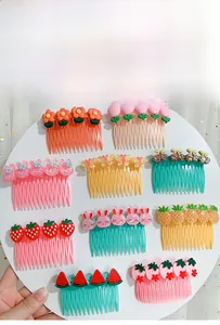 Detailed close-up of 10 assorted cartoon hair side combs for girls featuring colorful designs