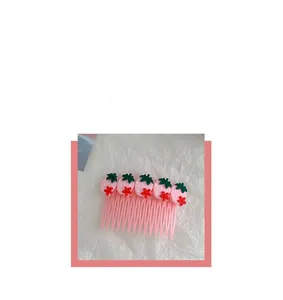 Pink girls hair side comb with cute strawberry patterns for organizing loose hair strands