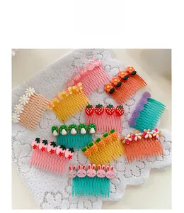 Colorful floral and animal cartoon hair side combs for girls arranged on white lace fabric
