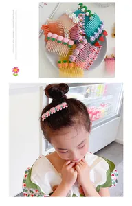 Close-up of colorful cartoon hair side combs with cute animal shapes for girls