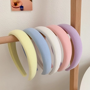 Chic padded sponge headbands in candy macaron colors for women on display