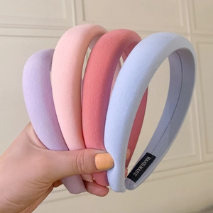 Padded candy color sponge headbands in pastel purple, pink, orange and blue shades
