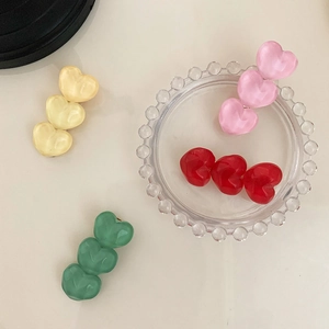 Colorful resin heart hair clips set in yellow, pink, red, and green for women and girls