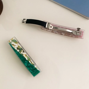 Elegant rectangle acetate spring hair clips in green and pink floral patchwork design