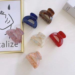 Vintage acetate hollow D-shape hair claws in marble patterns and multiple colors