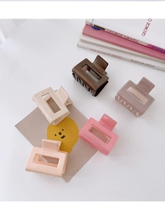 Pinces à cheveux minimalistes en acétate en cinq couleurs avec des livres déco