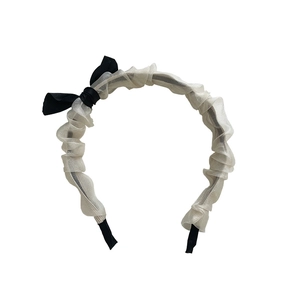 Pleated white chiffon headband with delicate black satin bow for women in French style
