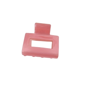 Pince à cheveux rectangulaire rose en acétate au design carré évidé et finition brillante