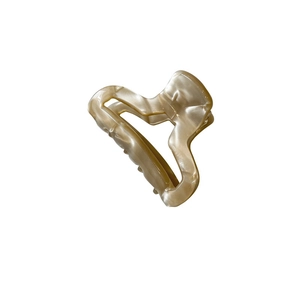 Vintage hollow acetate hair claw clip with creamy marble texture and mother of pearl finish