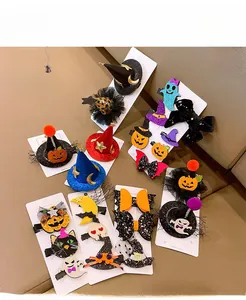 Detail of Halloween hair clips set featuring pumpkin ghost and bat designs with sequins