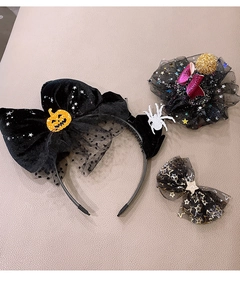 Three-piece Halloween hair accessories set with pumpkin bow headband and spider web hair clips