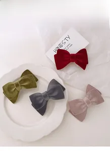 Set of four velvet bow hair clips in red, olive green, grey and pink colors