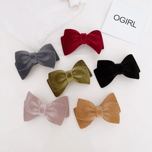Set of six velvet bow hair clips in elegant colors like burgundy and olive green