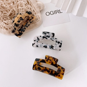 Set of three acetate rectangular claw clips in tortoise and marble floral patterns