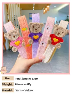 Detail of 33cm knitted bear headband with velcro closure for children hair styling