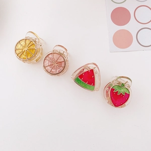 Set di quattro mollette per capelli in acrilico a forma di frutta con limoni e fragole