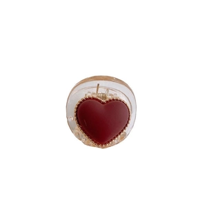 Minimalist red heart hair claw clip with gold beads on white background