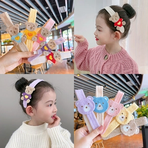 Cute knitted bear hairbands for girls in five vibrant colors including pink and purple