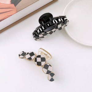 Minimalist black and white checkerboard circle hair claw clips in acrylic and metal